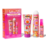 Amika everyday magic hair care product set with colorful packaging on a white background. products include: soulfood nourishing mask, perk up dry shampoo, and the wizard slicone-free detangling primer. 