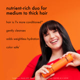 model holds amika normcore shampoo. text: "nutrient-rich duo for medium to thick hair. hair is 7x more conditioned*, gently cleanses, color safe. *clinically proven when shampoo + conditioner are used as a system. 