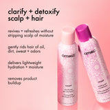amika reset shampoo and conditioner stand against a pink background. text: "clarify + detoxify scalp + hair. revives + refreshes without stripping scalp of moisture. gently rids hair of oil, dirt, sweat + odors. delivers lightweight hydration + moisture. removes product buildup."