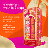 Amika Style Revival Icons dry shampoo and dry mask duo in a colorful patterned box, shown with two matching bottles beside it on a bright orange and magenta graphic background with text describing the waterless wash in 2 steps.