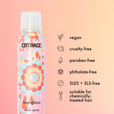 Amika top gloss shine spray bottle with product features on a pink background