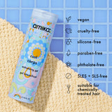 Amika Curl Corps gel can on a textured surface with brand information displayed.