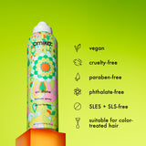 Amika texture spray can with green background and product features listed.