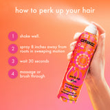 Amika hair product with usage instructions on an orange background