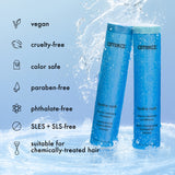 Two blue bottles of amika shampoo and conditioner with product features listed on a light blue background.