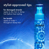 Amika water sign hydrating hair oil bottle with blue floral design on a blue background