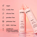 Amika flash instant shine mask bottles on a pink background with product details.