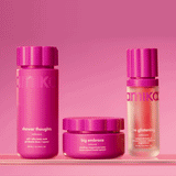 gif of a hand reaching for amika shower thoughts and then the model lathering their arm in the shower. 