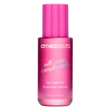A bottle of amika:aura 'will cause compliments' hair and body mist in a vibrant pink translucent bottle with a matching pink cap, set against a solid white background.
