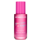 A bottle of amika:aura 'Your Aura Is Magic' hair and body mist, featuring a vibrant pink gradient bottle and cap on a solid white background.
