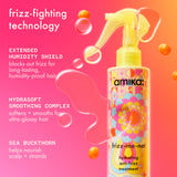 Amika frizz-me-not hair treatment spray bottle with features on a pink background