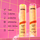 Amika 'forget frizz' shampoo and conditioner bottles on a pink background with product features listed.