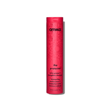 A single Amika 'The Protector' color-protected strengthening shampoo bottle, featuring a vibrant pink cylindrical design with a matching pink cap, set against a plain white background with a soft shadow.