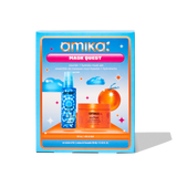 A product image of Amika's 'Mask Quest' nourish and hydrate mask set in blue and orange packaging. The box shows two full-size products: Dream Routine Overnight Hydration Treatment and Soulfood Nourishing Mask. The design features a colorful, playful layout with clouds and an orange illustration.