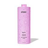 Pink bottle of amika 'big hit' volumizing conditioner on a white background