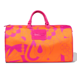 image of amika's duffle bag - an orange and pink bag with a pink logo plate and pink handles. the bag sits on a white background. 