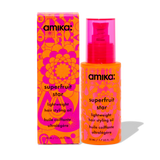 image of a pink and orange bottle with black lettering. amika superfruit star lightweight hair styling oil 50 ml / 1.7 US fl. oz. next to the bottle is its display box, also pink and orange patterned with black lettering. 